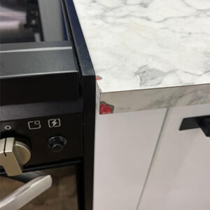 Kitchen laminate benchtop chip repairs - before photo