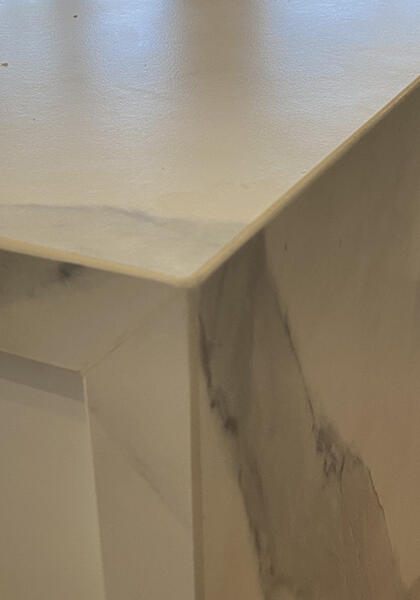 Large chip repair on corner of marble kitchen bench top