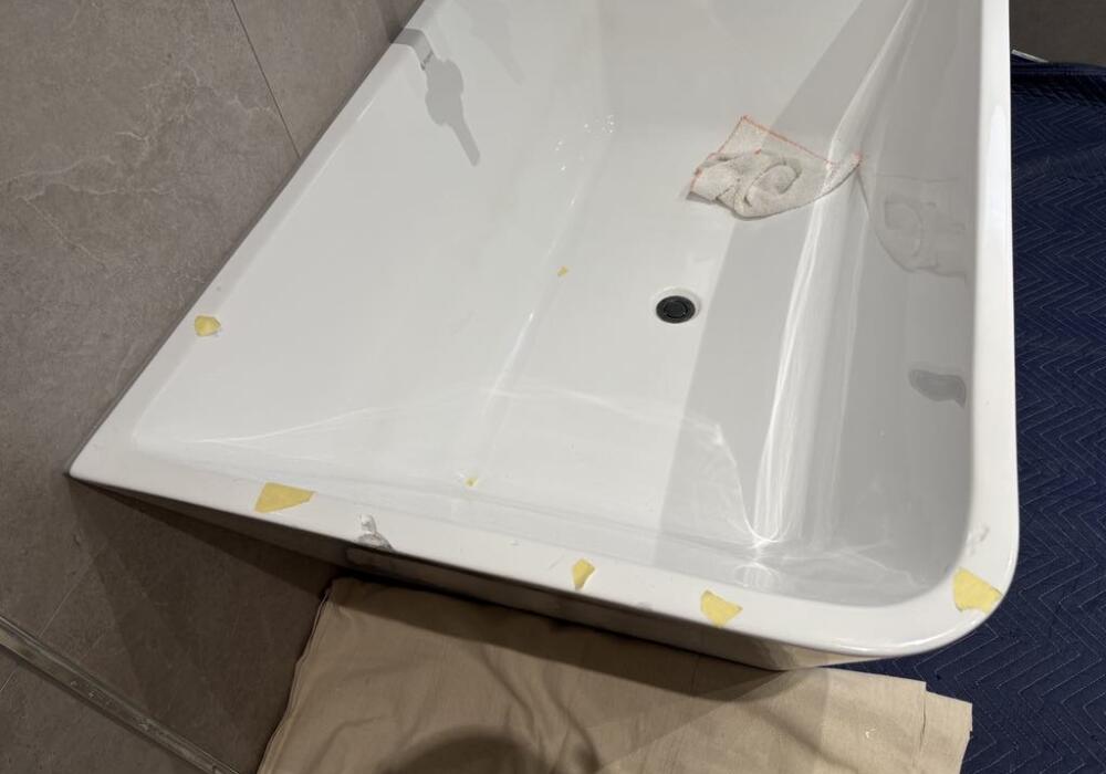 Acrylic Bath with lots of chips (JC - February 2025 (before - Several Chips On Bath)