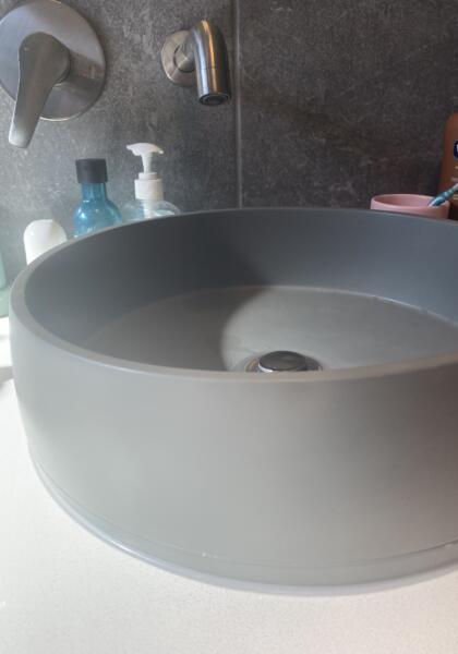 Chip On Outside Edge Of Basin - After
