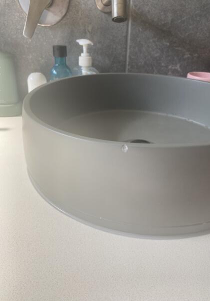 Chip On Outside Edge Of Basin - Before